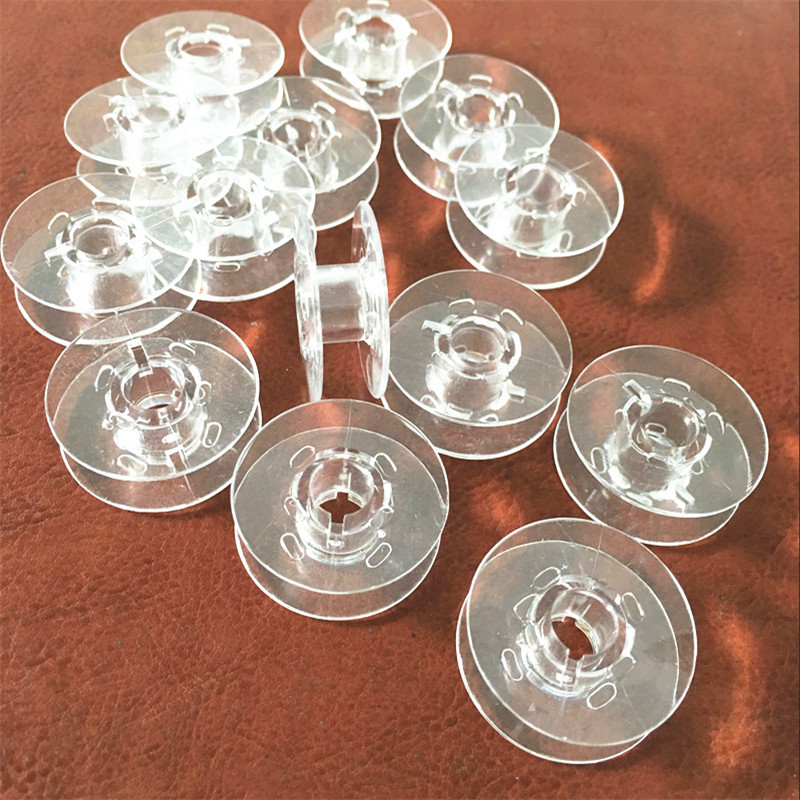 Gelendong jahit bening plastik - Sewing Machine Yarn ulasan dan harga