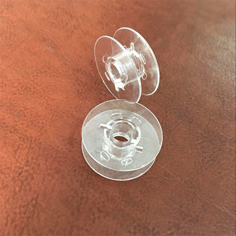 Gelendong jahit bening plastik - Sewing Machine Yarn ulasan dan harga